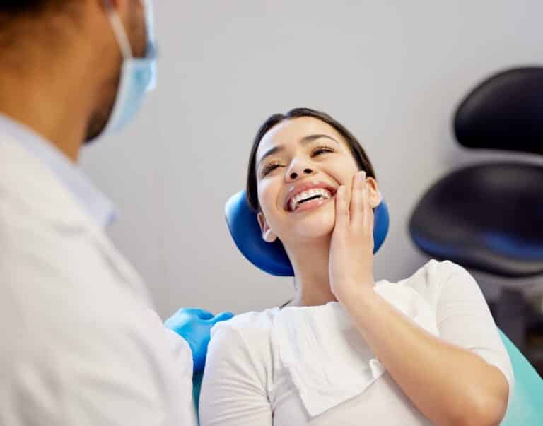 woman dentist and happy for dental surgery in clinic with